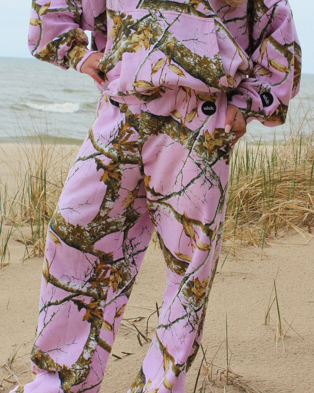 pink camo sweatpants at the beach 