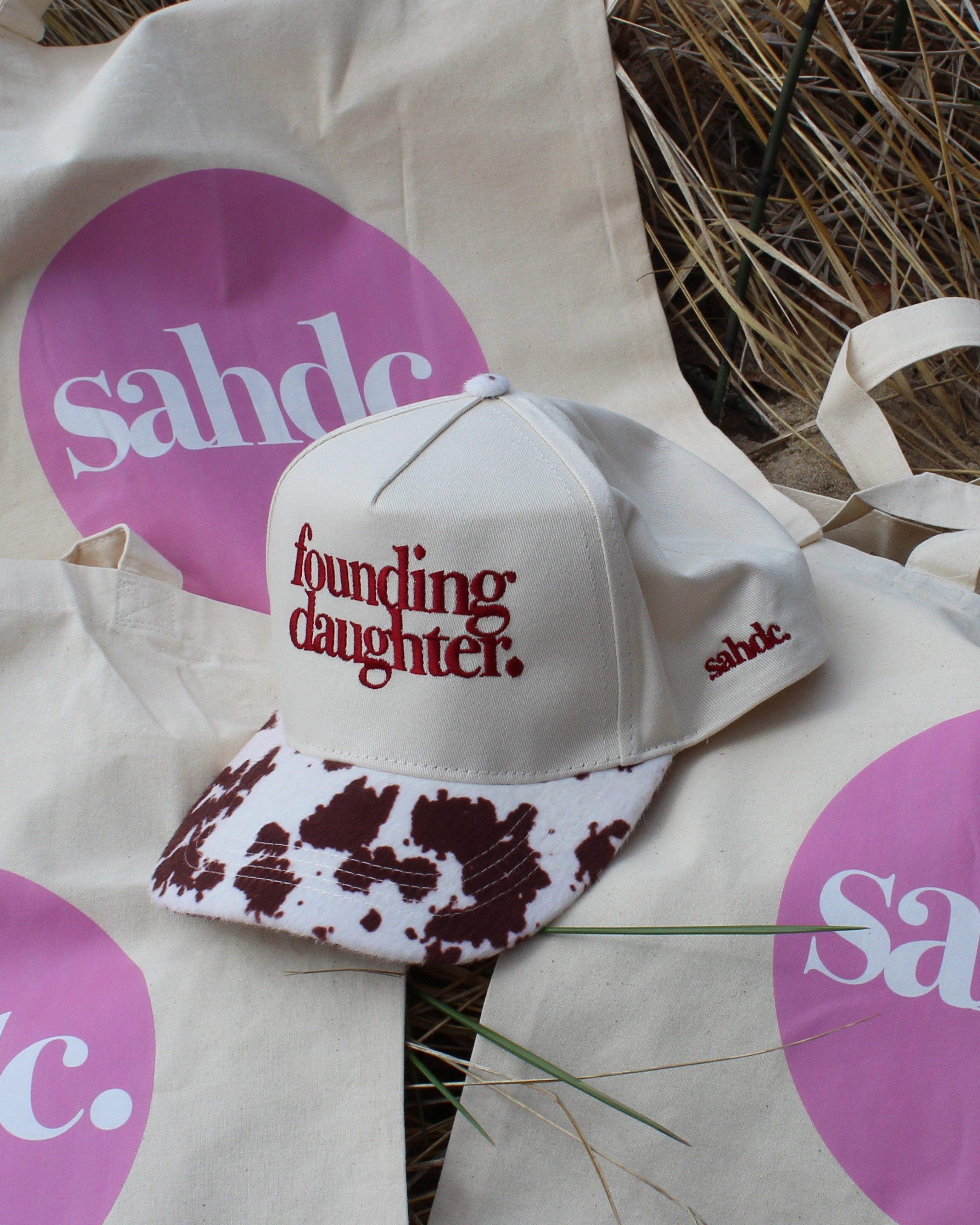 tote bags and daughter hat. cow print brim 